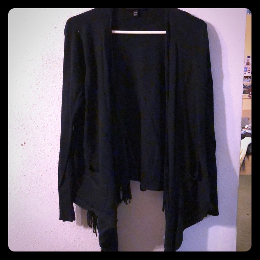Open sweater with hanging fringed folds